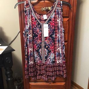 Ladies print sleeveless top with peplum